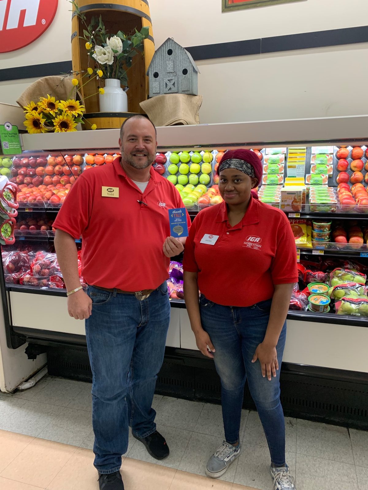 Todd Keller with a Winn-Dixie team member in the store